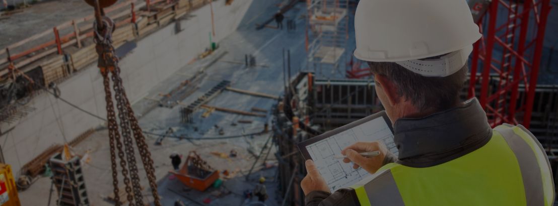 Construction project manager on site with a tablet device